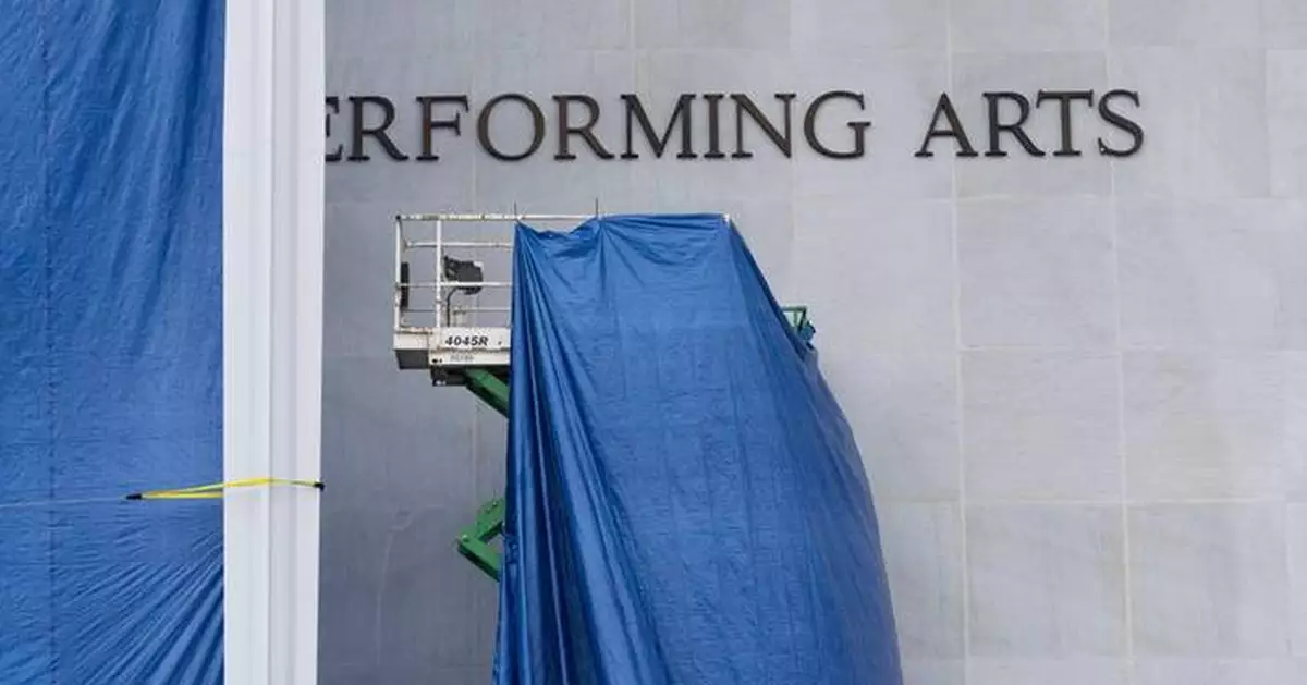 Photos of Trump's name being added to the Kennedy Center