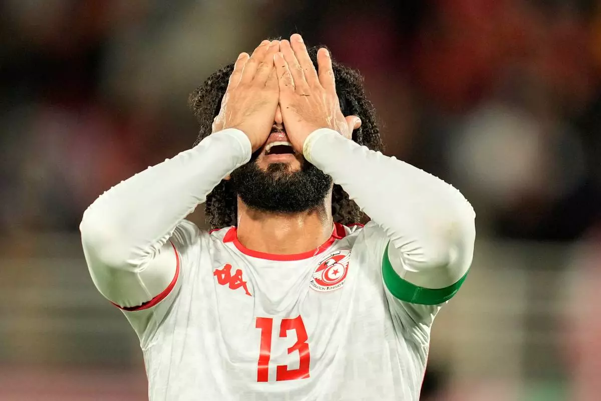 Tunisia's Ferjani Sassi reacts during the Africa Cup of Nations group C soccer match between Nigeria and Tunisia in Fez, Morocco, Saturday, Dec. 27, 2025. (AP Photo/Mosa'ab Elshamy)