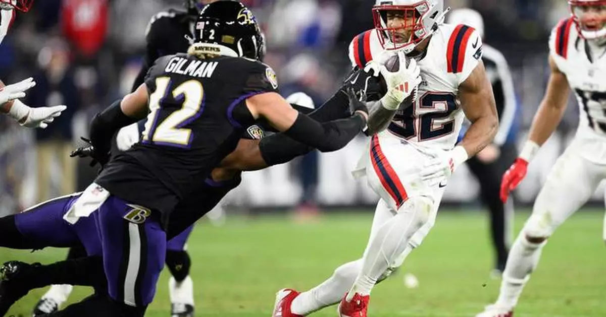 Patriots rookie RB Tre'Veyon Henderson sidelined against Ravens with head injury