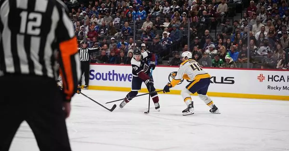 MacKinnon has goal and assist as Avalanche beat Predators 4-2 for 11th straight home win