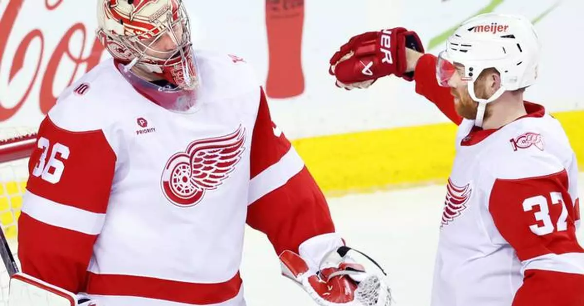 Alex DeBrincat has 2 goals and an assist as Red Wings hold off Flames 4-3