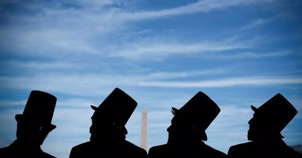 Photos show mock funeral for the penny at Lincoln Memorial