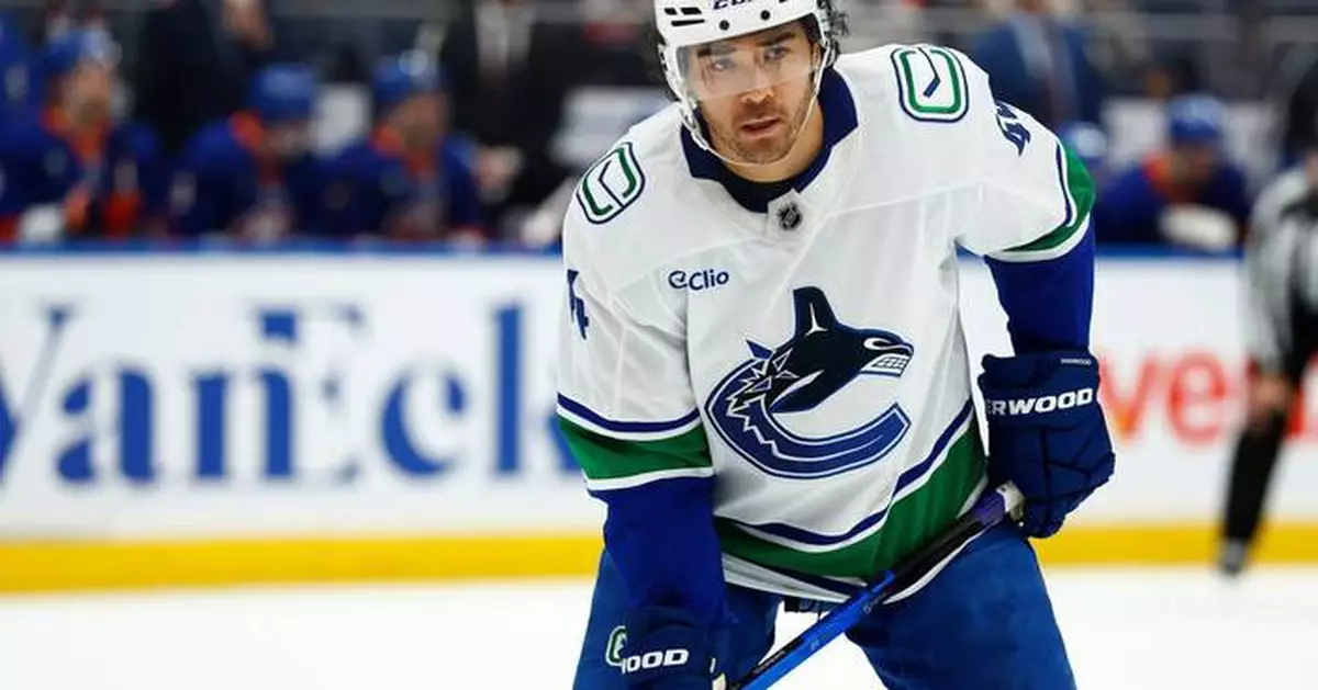 Kiefer Sherwood has hat trick as Canucks beat Islanders 4-1 for 3rd straight win