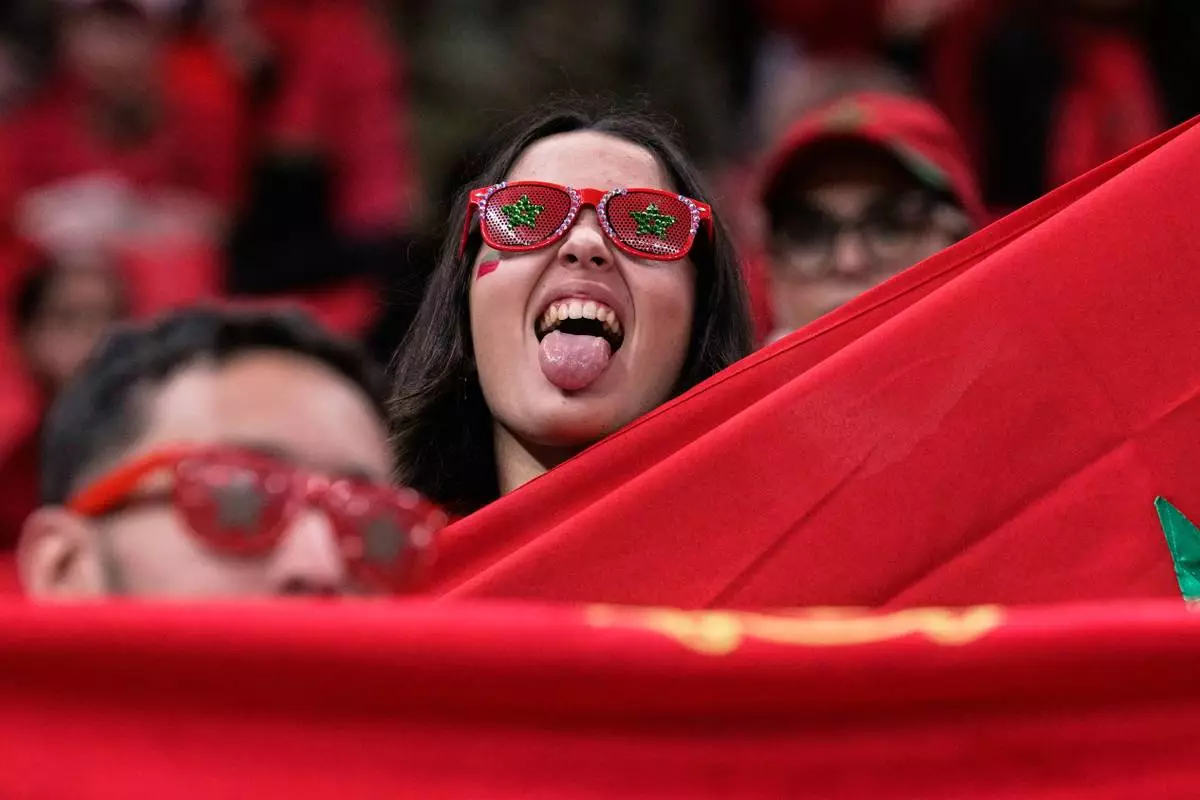 Morocco fans wait for the start of the Africa Cup of Nations group A soccer match between Zambia and Morocco in Rabat, Morocco, Monday, Dec. 29, 2025. (AP Photo/Themba Hadebe)