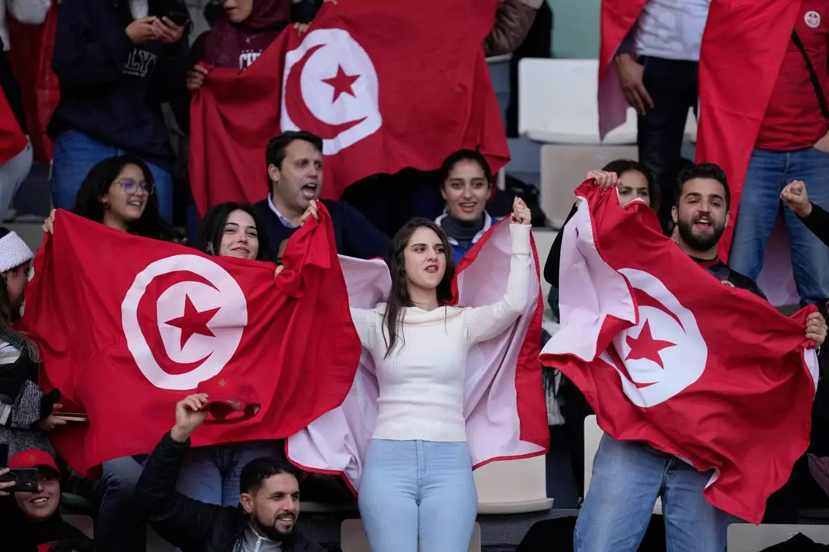 Tunisia's supporters wait for the start of the Africa Cup of Nations group C soccer match between Tanzania and Tunisia in Rabat, Morocco, Tuesday, Dec. 30, 2025. (AP Photo/Mosa'ab Elshamy)