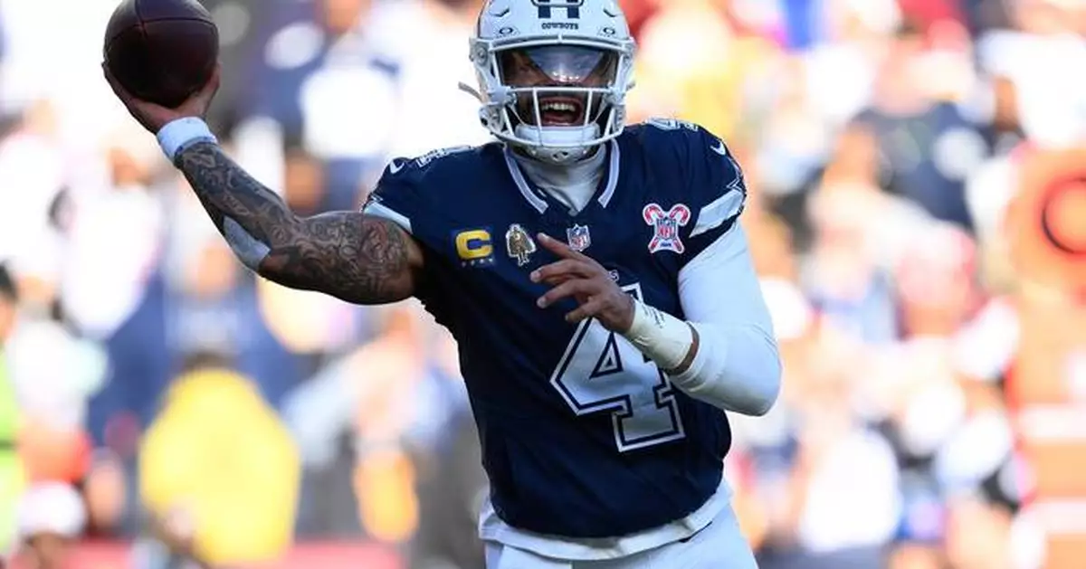 Dak Prescott throws for 307 yards and 2 TDs to lead Cowboys past skidding Commanders 30-23