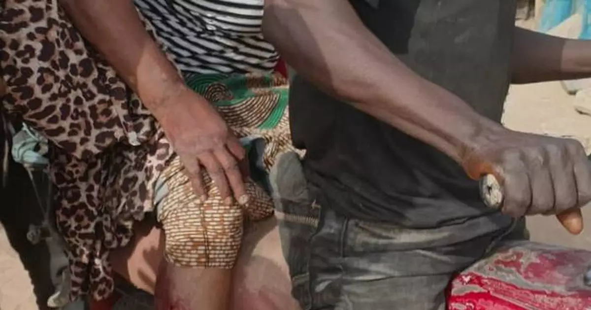 Nigerian soldiers open fire on protesters in the northeast, killing 9, witnesses say