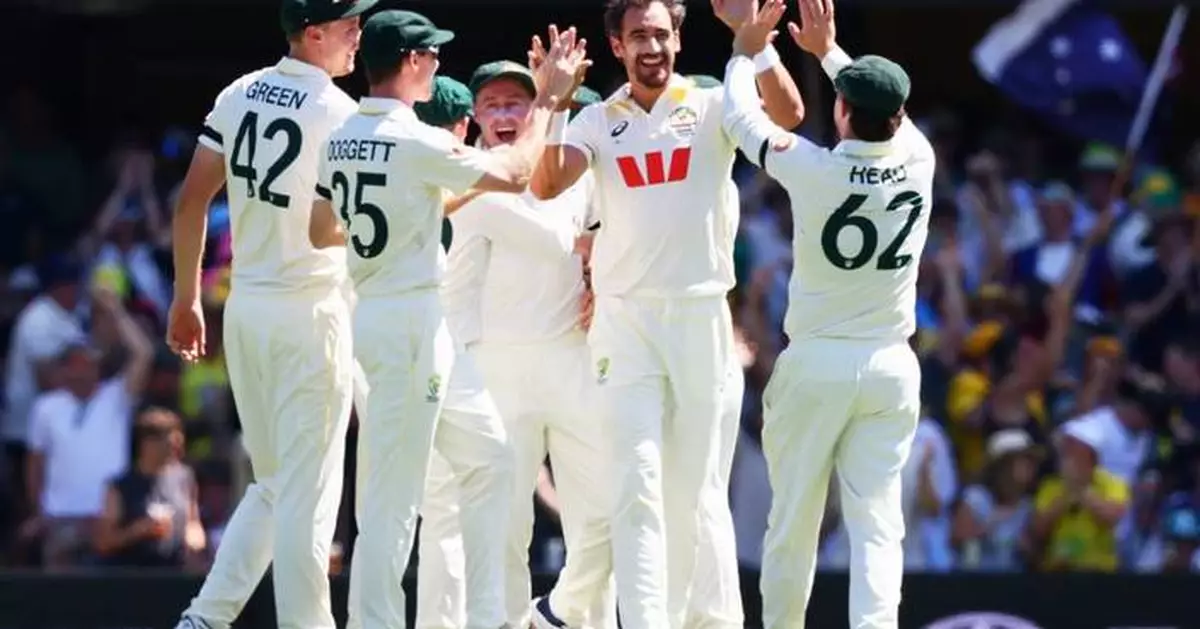 Root's first century in Australia tops Starc's 6 wickets as England takes honors on Day 1