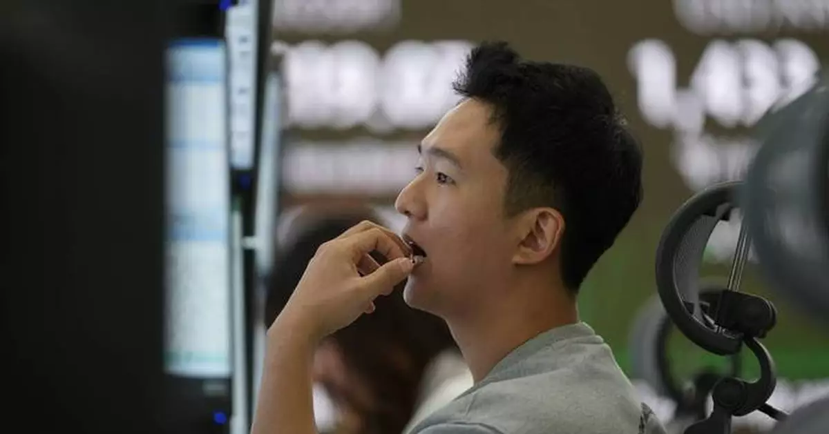 Stocks waver as 2025 winds down while gold and silver rise