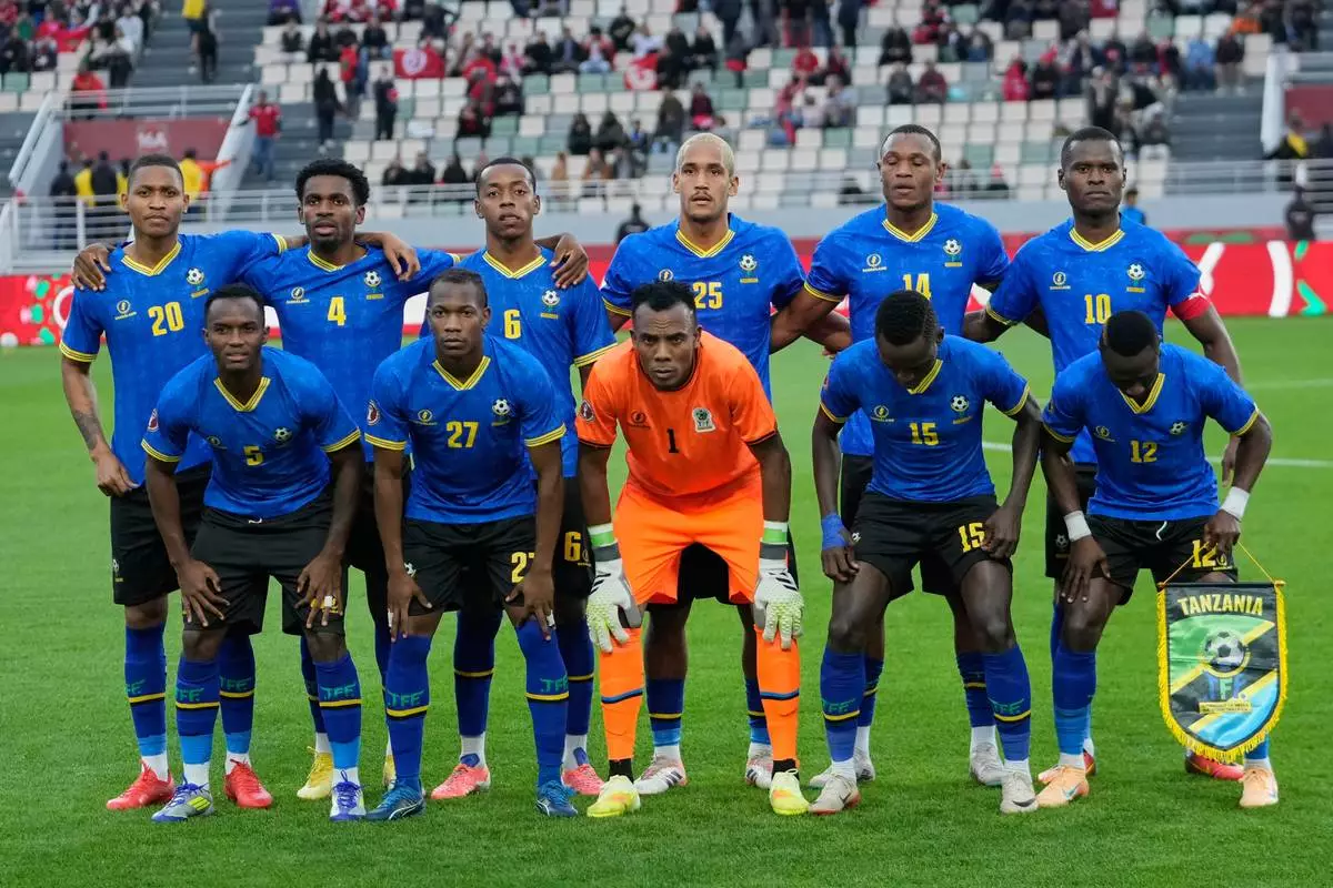 Tanzania's players pose before the Africa Cup of Nations group C soccer match between Tanzania and Tunisia in Rabat, Morocco, Tuesday, Dec. 30, 2025. (AP Photo/Mosa'ab Elshamy)