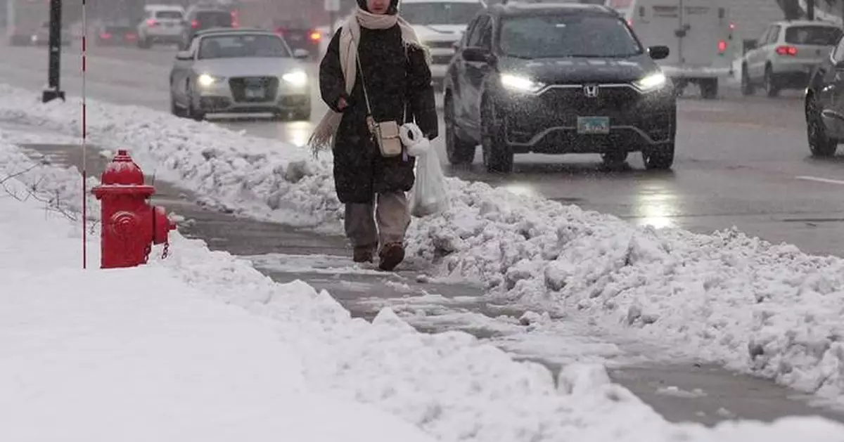 Winter's first big snowstorm hits the Northeast as schools close and traffic slows