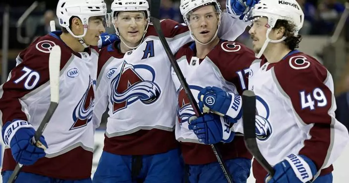 MacKinnon scores twice as the Avalanche beat the Rangers 3-2 in overtime