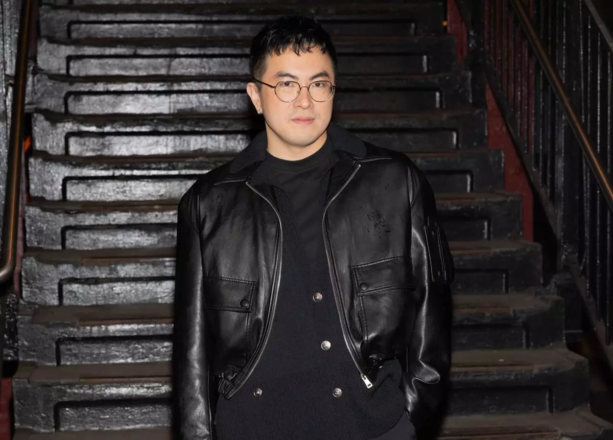 Bowen Yang attends the CHANEL 2025/26 Métiers d'art fashion show at Bowery subway station, Tuesday, Dec. 2, 2025, in New York. (Photo by CJ Rivera/Invision/AP)