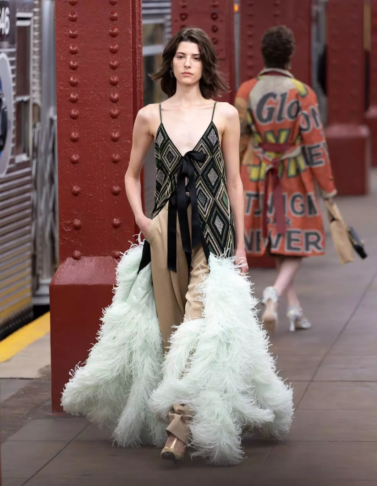 A model walks the runway during the CHANEL 2025/26 Métiers d'art fashion show at Bowery subway station, Tuesday, Dec. 2, 2025, in New York. (Photo by CJ Rivera/Invision/AP)