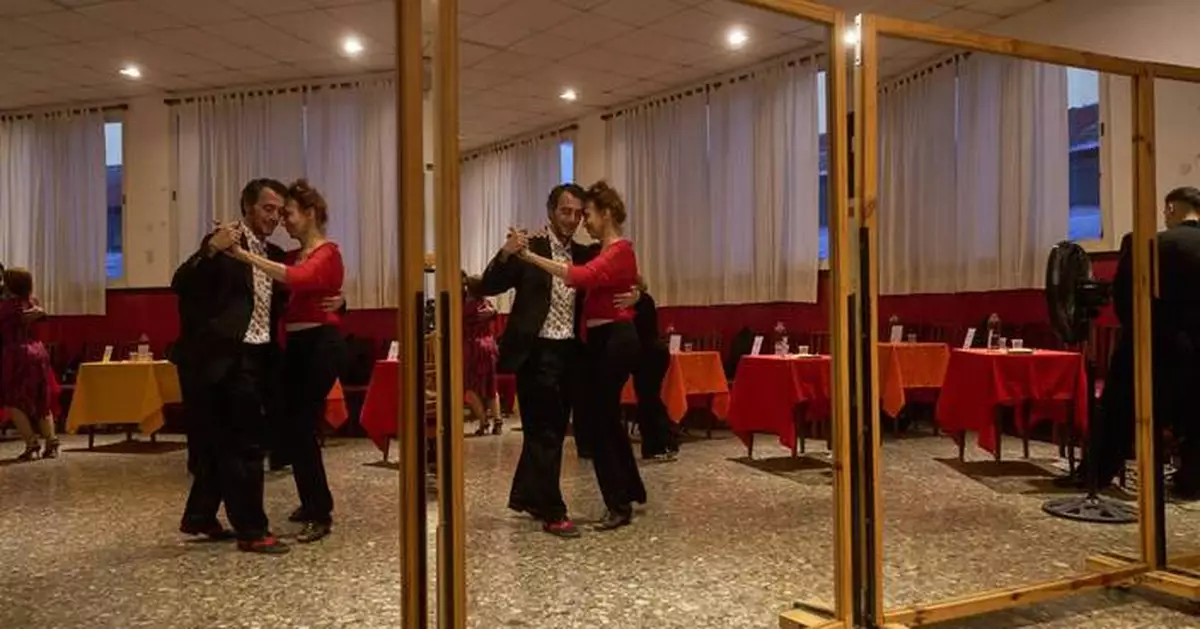 A dance hall in Buenos Aires guarantees tango sessions with professional partners