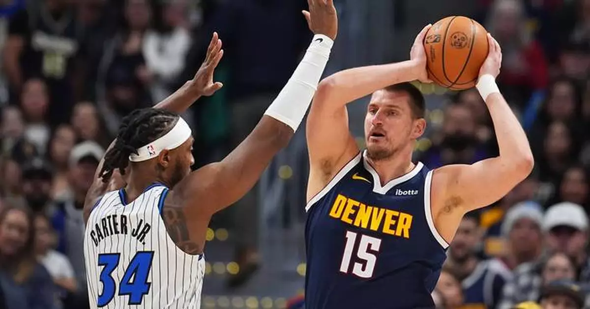 Jokic sets the career record for assists by a center as the Nuggets beat the Magic 126-115