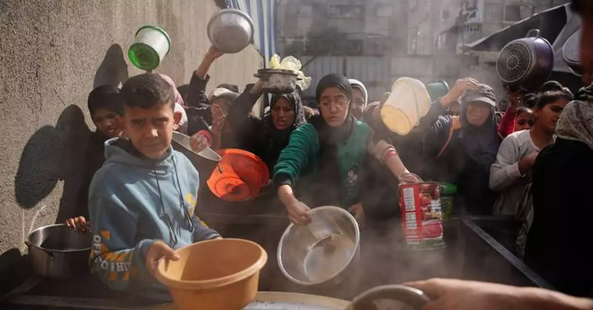 Spread of famine in Gaza Strip averted but Palestinians there still face starvation, experts say