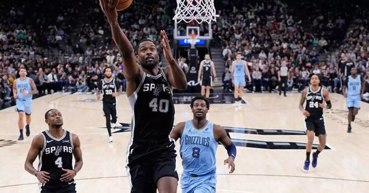 Harrison Barnes scores 31 points as the San Antonio Spurs beat the Memphis Grizzlies 126-119
