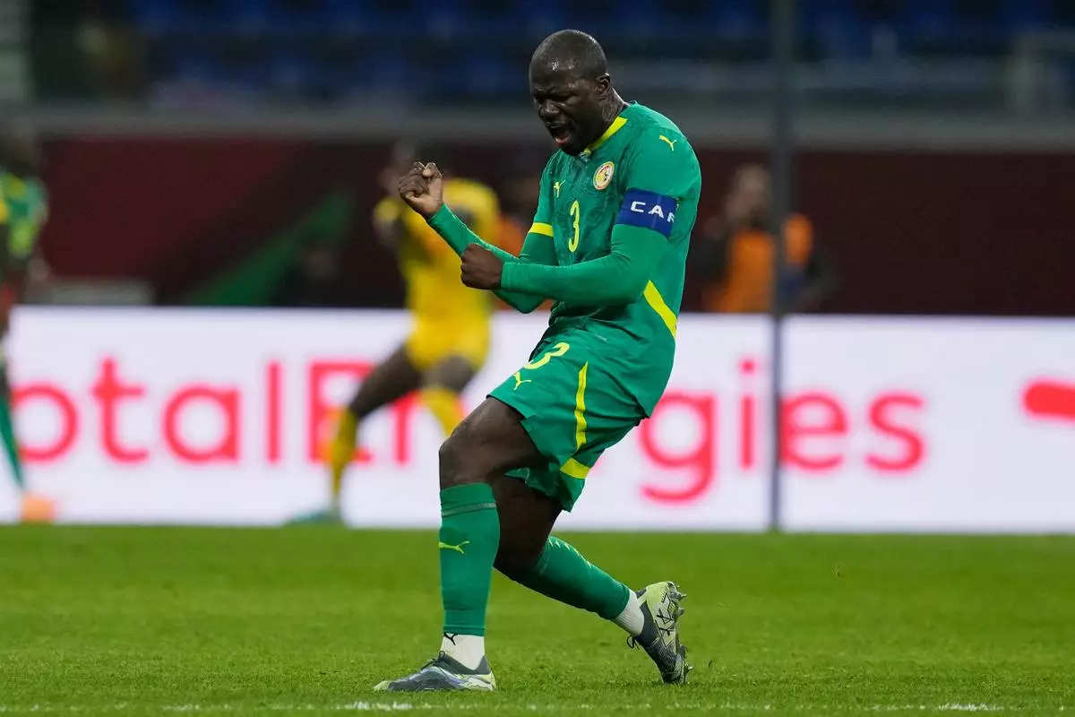 Senegal's Kalidou Koulibaly celebrates the second goal during the Africa Cup of Nations group D soccer match between Benin and Senegal in Tangier, Morocco, Tuesday, Dec. 30, 2025. (AP Photo/Themba Hadebe)