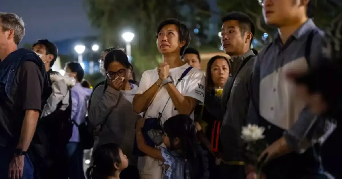 Hong Kong leader says fire investigation 'must uncover the truth' and promises construction reforms