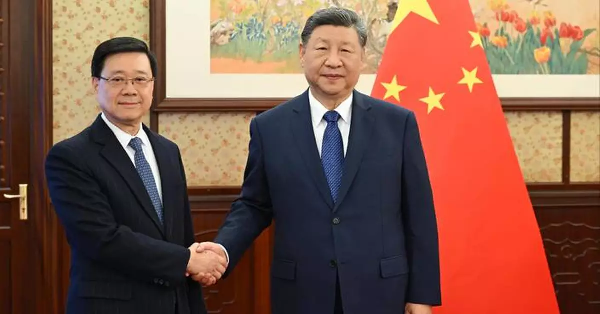 John Lee reports to Xi Jinping on Jimmy Lai case and Tai Po fire response efforts.