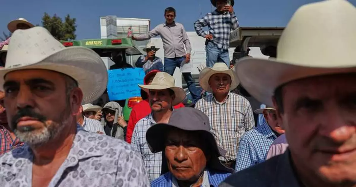 Farmers block Mexico's Congress with tractors in protest against new national water law proposal