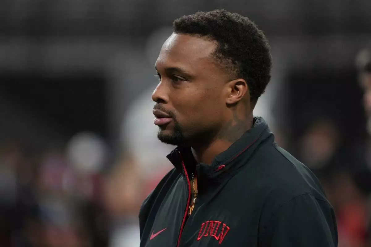 FILE - UNLV Offensive Coordinator Brennan Marion in the second half during an NCAA college football game against Syracuse, Friday, Oct. 4, 2024, in Las Vegas. Syracuse won 44-41 in overtime. (AP Photo/Rick Scuteri, File)