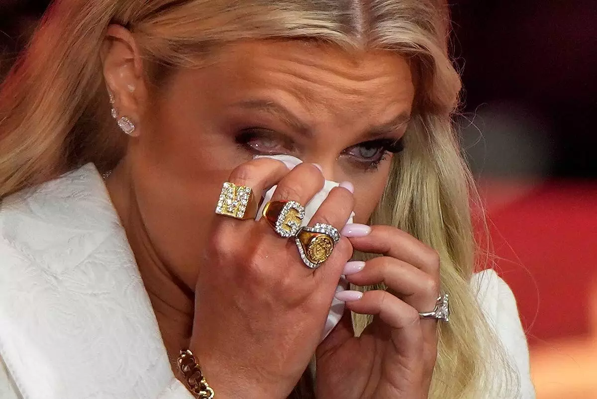 Erika Kirk wipes tears as she prepares to speak at a memorial for her husband, conservative activist Charlie Kirk, on Sept. 21, 2025, in Glendale, Ariz. (AP Photo/Julia Demaree Nikhinson, File)