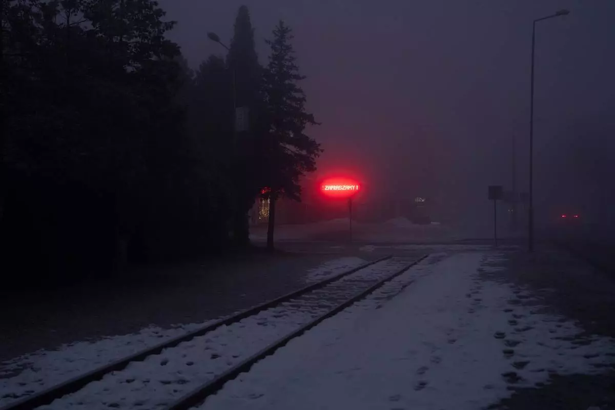 Snow covers railroad tracks that were once used to transport Jews from across Europe to Auschwitz, the Nazi German extermination and labor camp, in Oswiecim, Poland, on Jan. 23. 2025. (AP Photo/Oded Balilty, File)