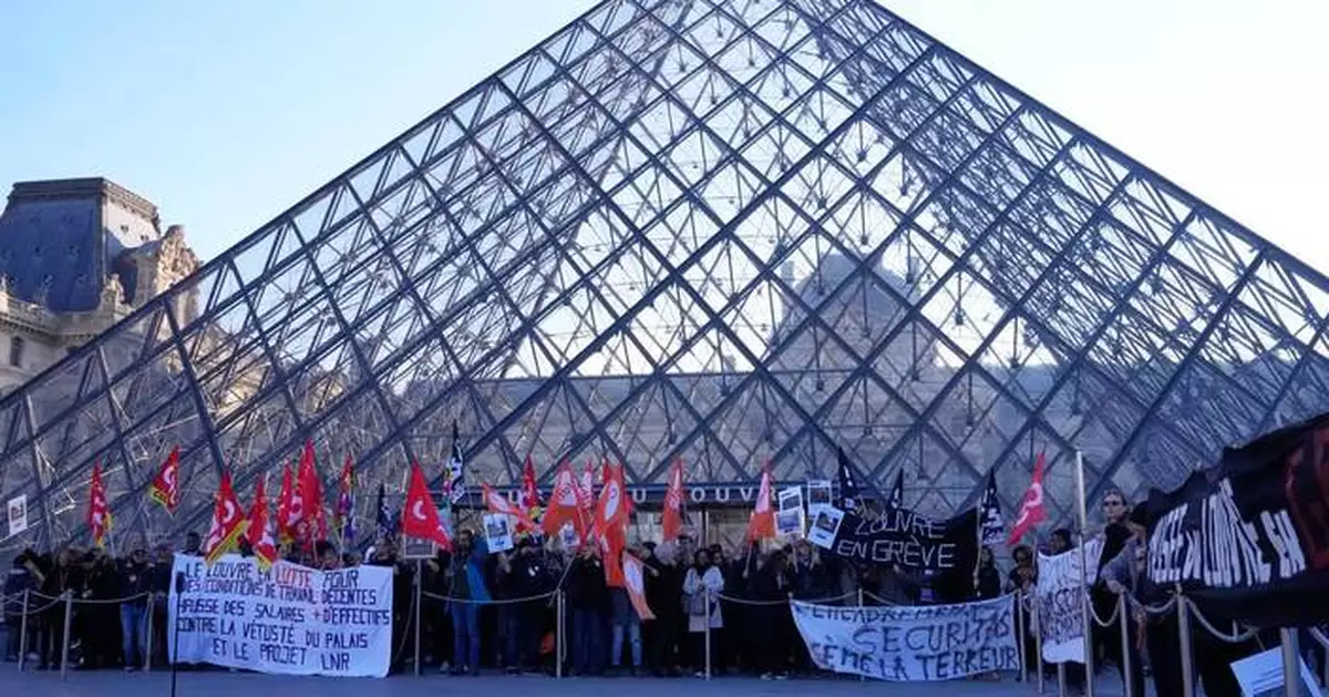 Louvre workers vote to extend a strike as the museum partially reopens