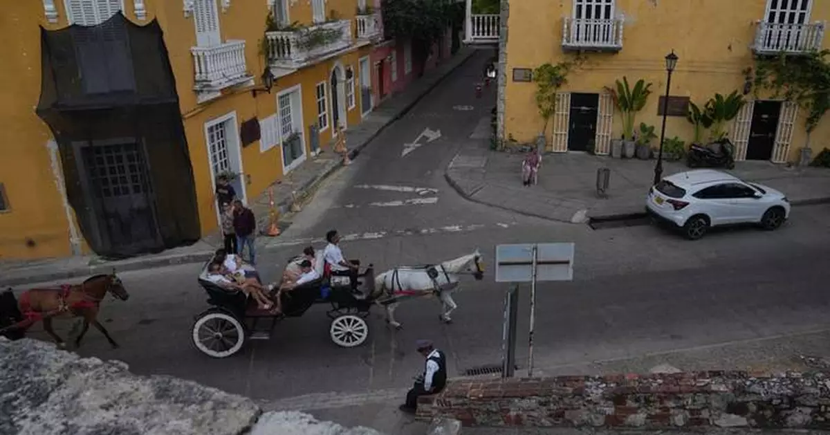 A Colombian city swaps iconic horse buggies for electric carriages amid animal welfare concerns