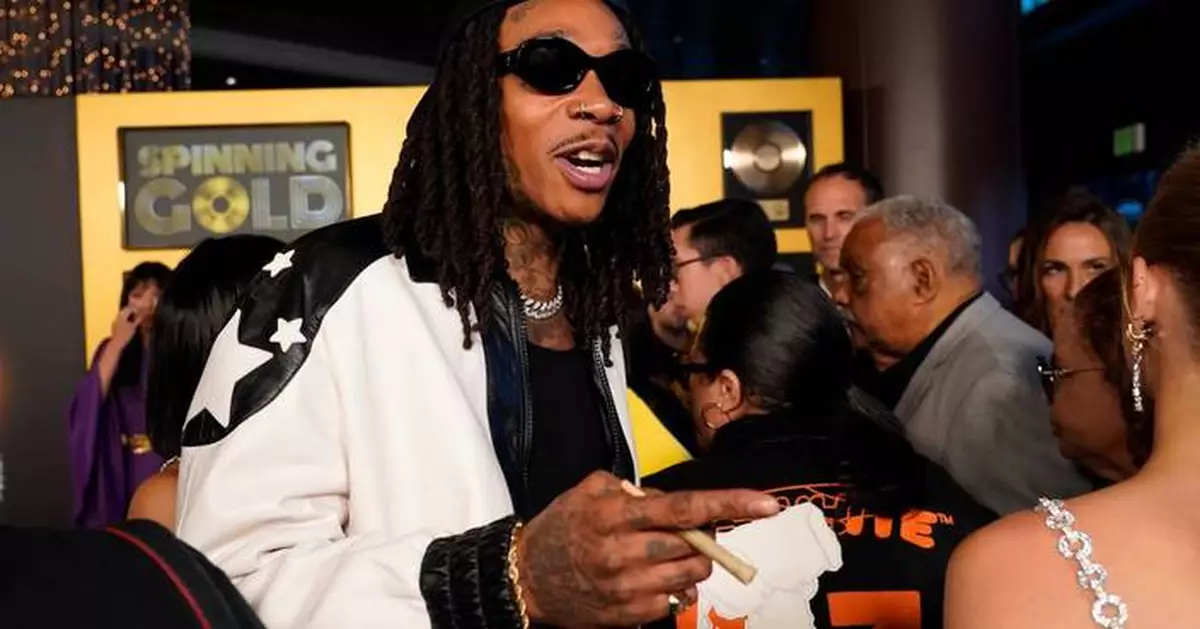 Romanian court sentences US rapper Wiz Khalifa to 9 months for drug possession