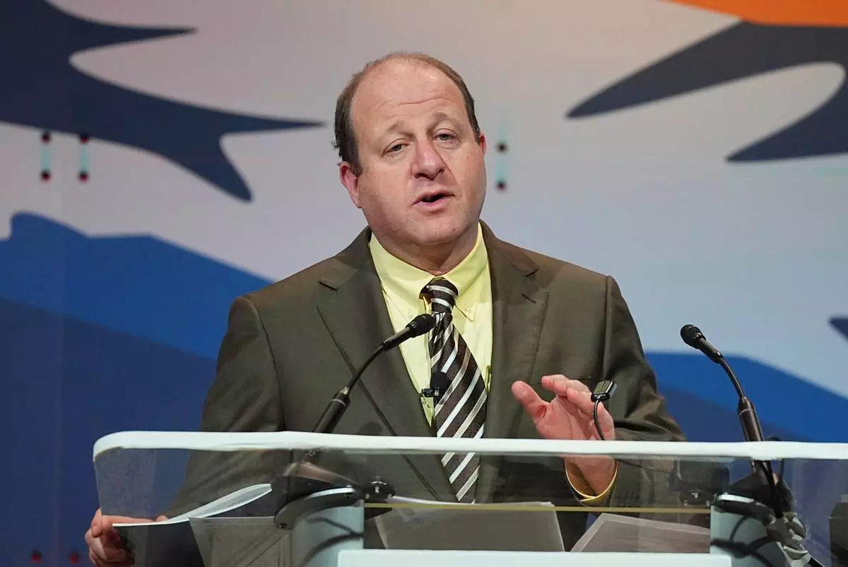 FILE - Colorado Gov. Jared Polis speaks to the National Governors Association at the Broadmoor Hotel in Colorado Springs, Colo., July 25, 2025. (AP Photo/David Zalubowski, File)