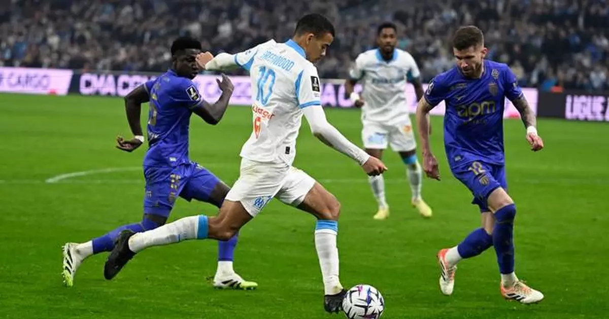 Lens claims Christmas top spot in Ligue 1. Greenwood's late goal helps Marseille beat Monaco