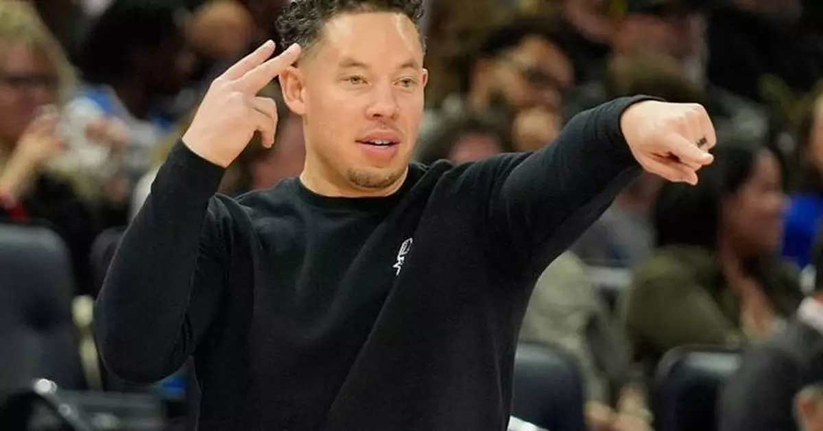 Adversity has been a constant for Mitch Johnson in his Spurs' tenure. He's handling things with ease