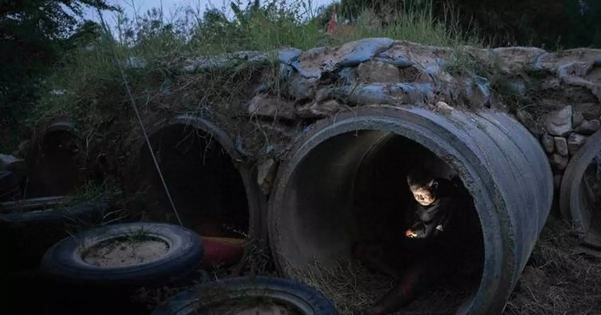 Photos show locals in Thailand and Cambodia taking shelter as border conflict intensifies