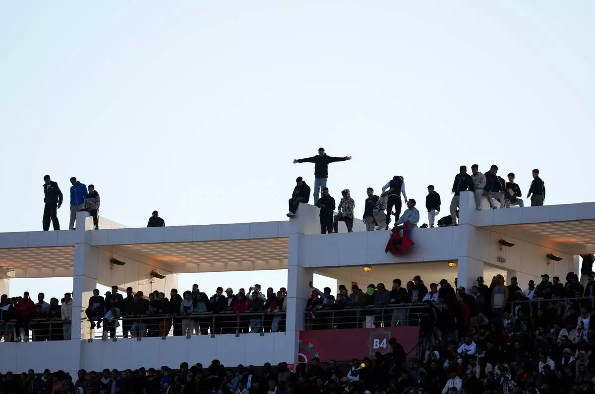 Fans watch from the stands during the Africa Cup of Nations group B soccer match between Egypt and South Africa in Agadir, Morocco, Friday, Dec. 26, 2025. (AP Photo/Themba Hadebe)
