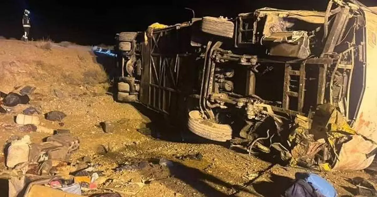 Bus crash kills 13 and injures over a dozen on highway in central Iran