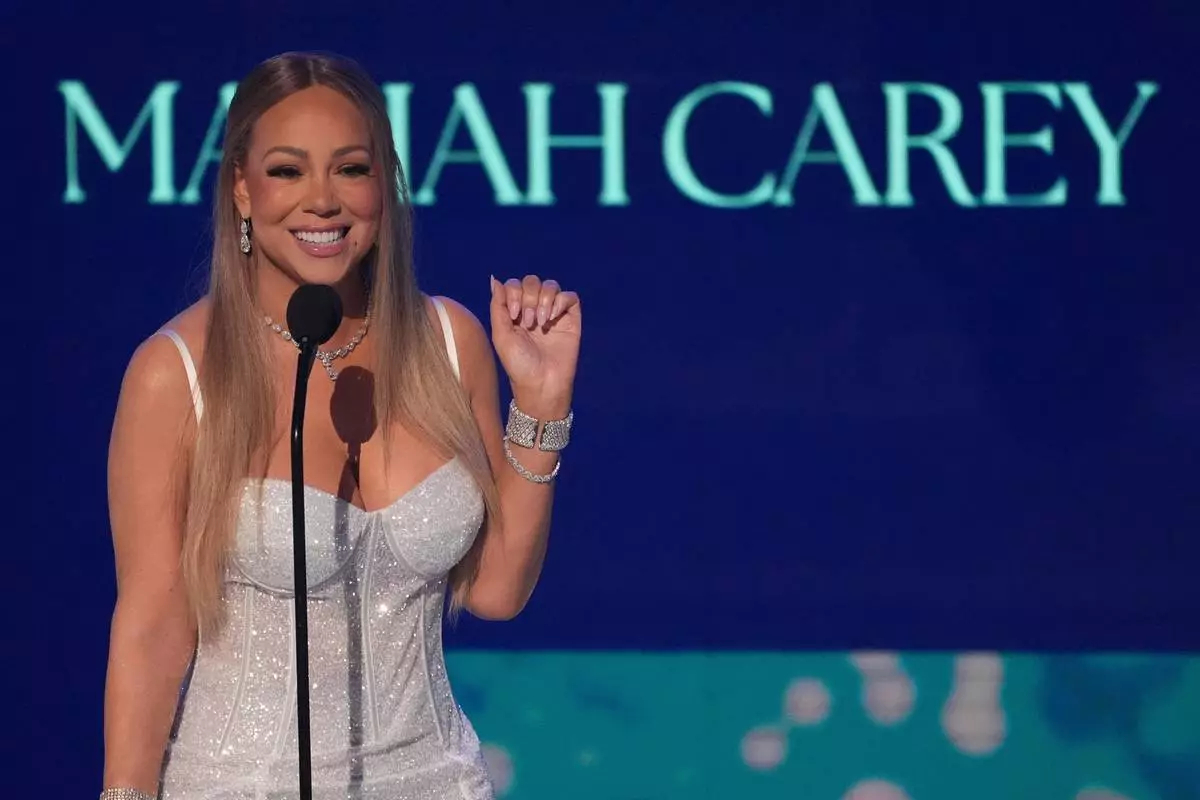 FILE - Mariah Carey accepts the ultimate icon award during the BET Awards on Monday, June 9, 2025, at the Peacock Theater in Los Angeles. (AP Photo/Chris Pizzello, File)
