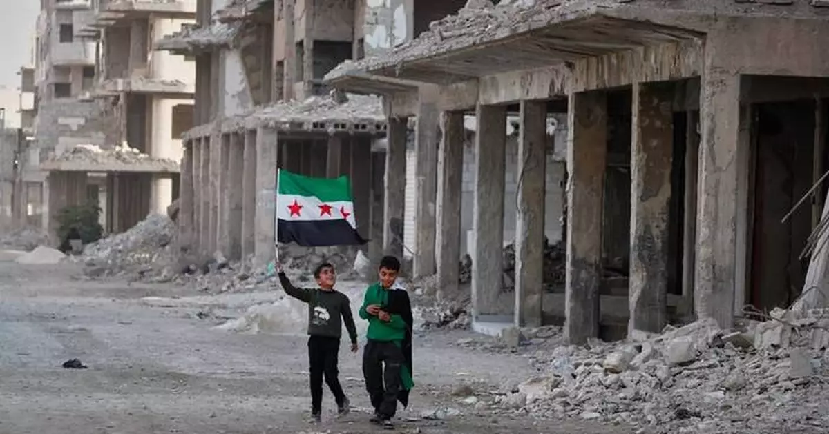 Syrians celebrate a year after Bashar Assad’s fall, in photos