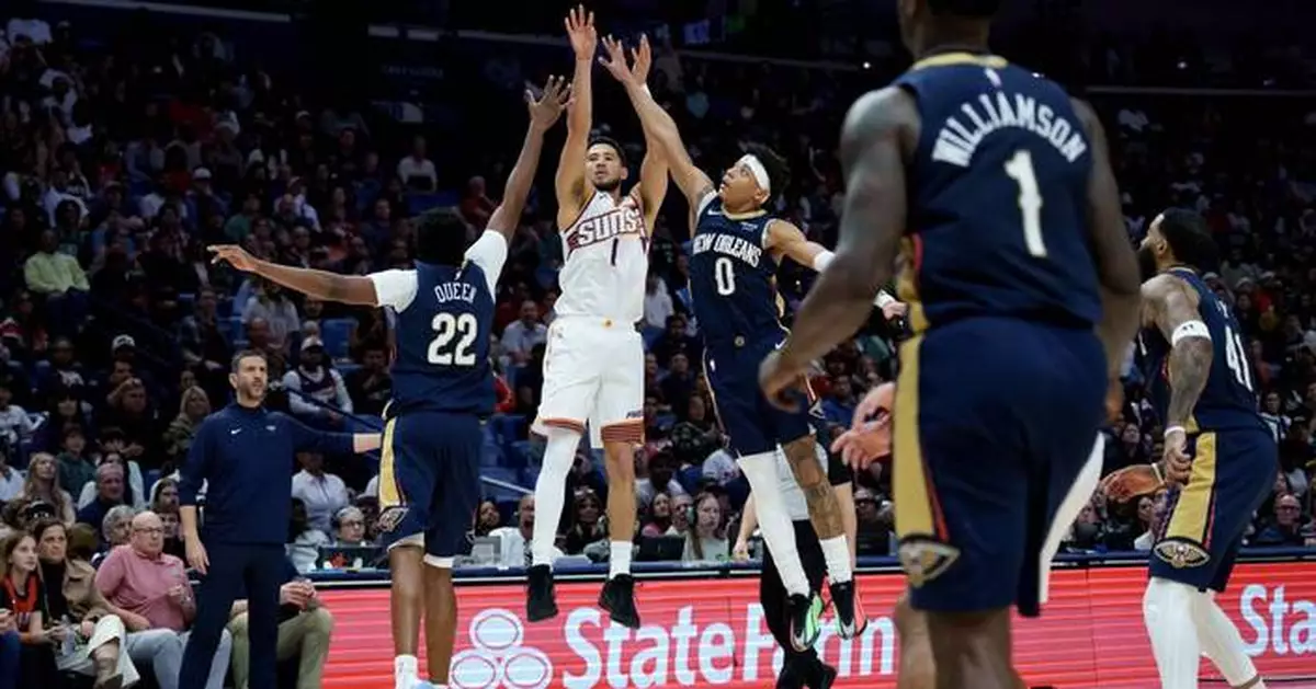 Booker leads Suns past Pelicans 123-114 after Alvarado and Williams exchange punches in testy game