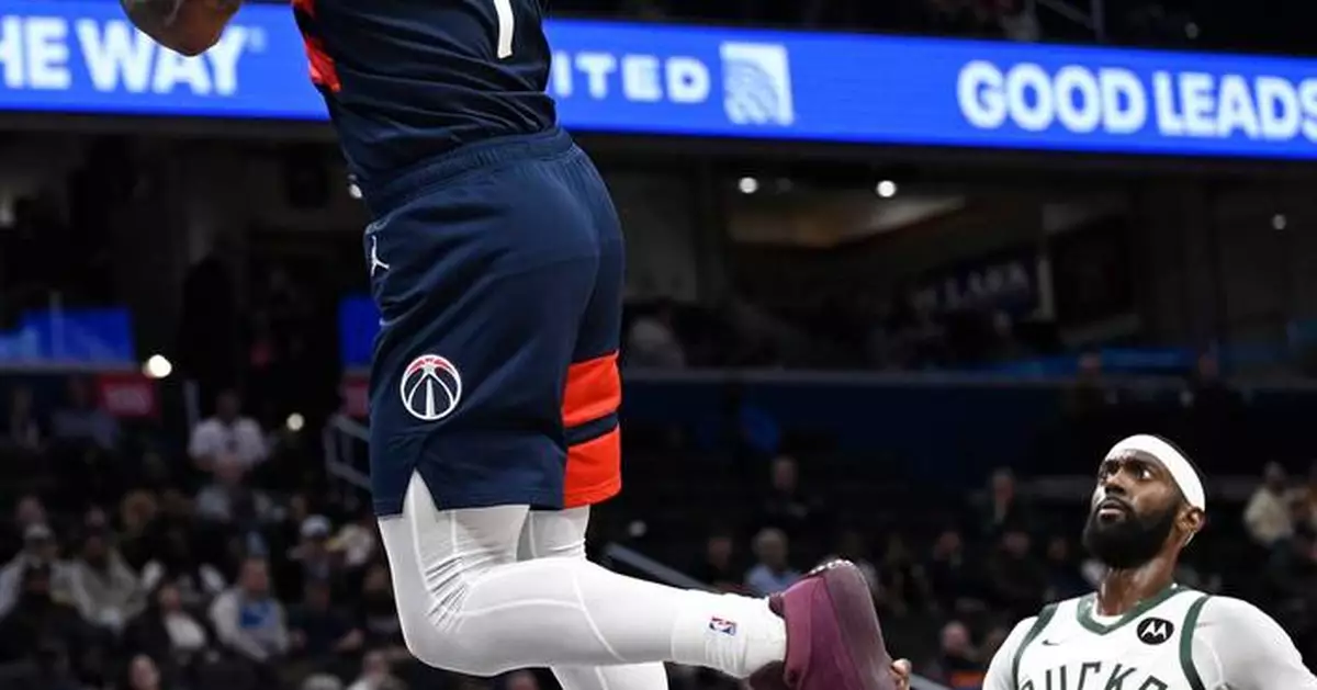 McCollum and Middleton lead the Wizards to a 129-126 win over Milwaukee despite Porter's 30 points