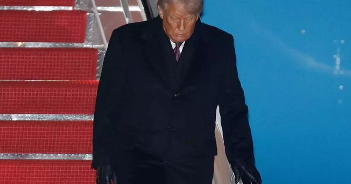 The Latest: Global leaders say world economy shows resilience