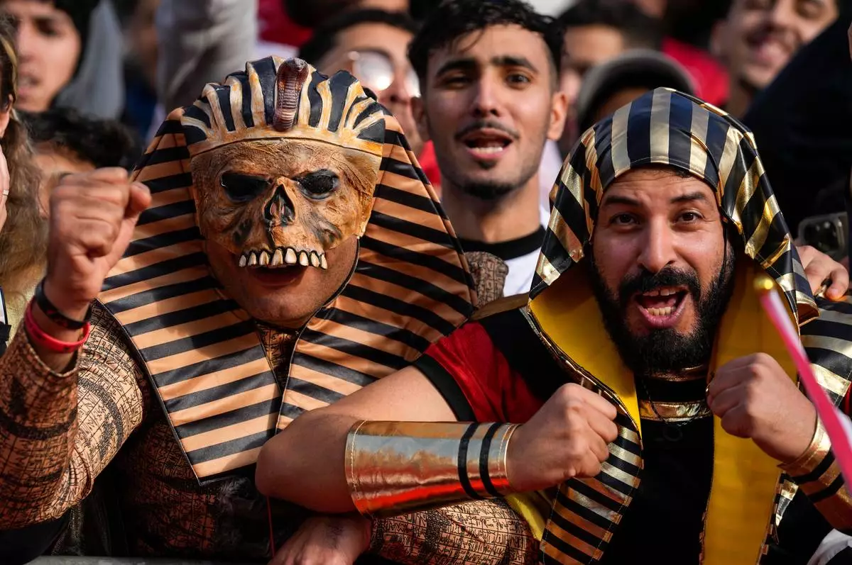 Egypt fans support their team during the Africa Cup of Nations group B soccer match between Egypt and South Africa in Agadir, Morocco, Friday, Dec. 26, 2025. (AP Photo/Themba Hadebe)