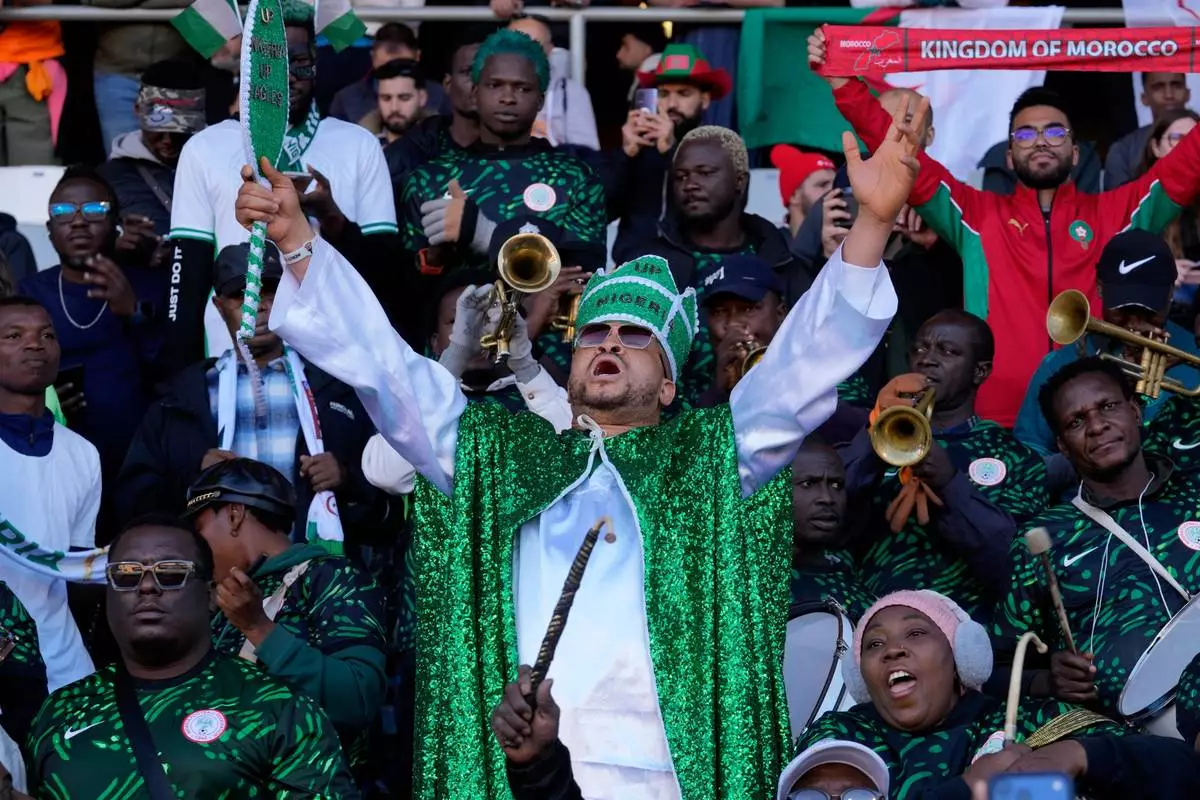 Nigeria fans cheer before the start of the Africa Cup of Nations quarterfinal soccer match between Nigeria and Algeria, in Marrakech, Morocco, Saturday, Jan. 10, 2026. (AP Photo/Themba Hadebe)