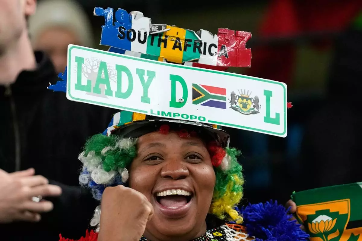 South Africa fans celebrate ahead of the Africa Cup of Nations round of 16 soccer match between South Africa and Cameroon in Rabat, Morocco, Sunday, Jan. 4, 2026. (AP Photo/Themba Hadebe)