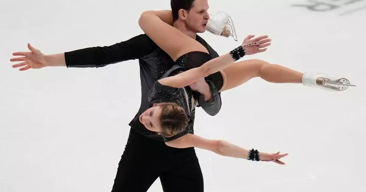 Skating pair took title at U.S. nationals but can't compete in Olympics after passport delay