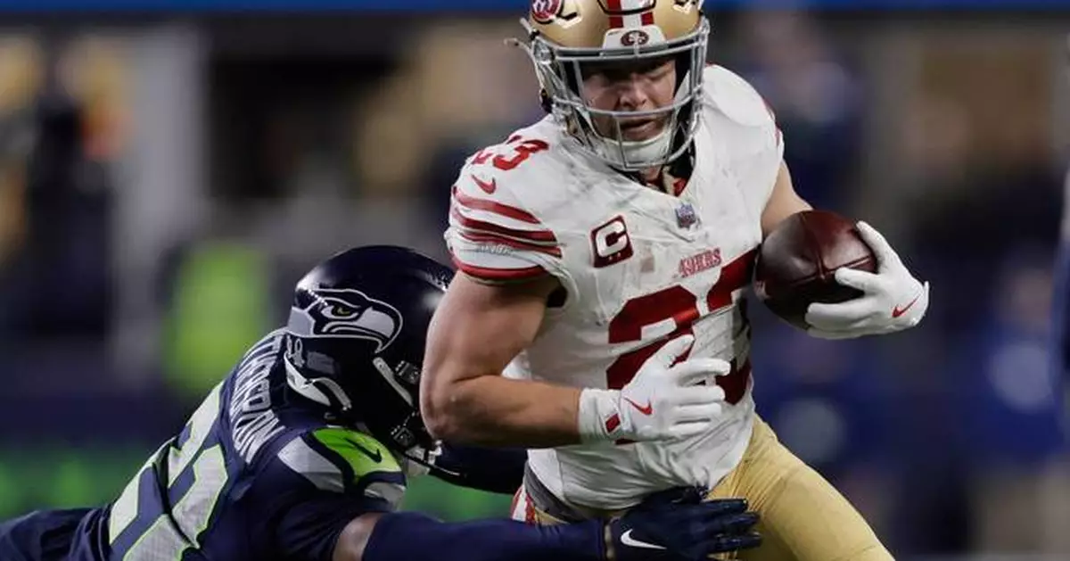 49ers star RB Christian McCaffrey injured in playoff game against Seahawks, returns in 3rd quarter