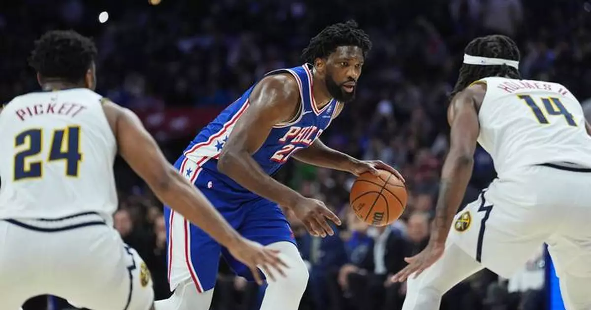 Brown's goaltended layup in OT lifts short-handed Nuggets over 76ers 125-124
