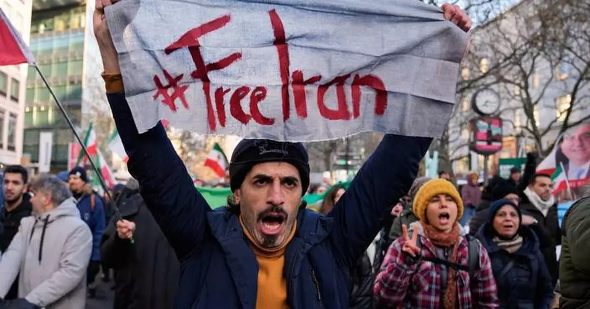 People rally around the world in support of protests in Iran, in photos